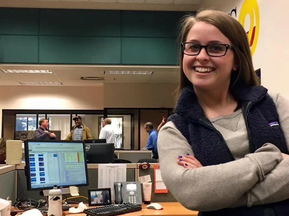 Shannen Sharpe at her producer desk in the newsroom